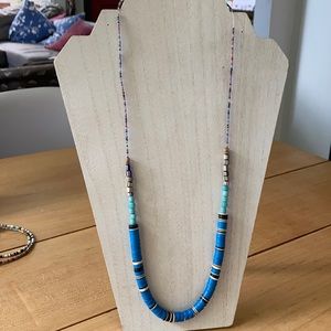 Handmade African vinyl and seed bead necklace.